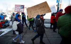 Educators  strike  for  greater  pay  because  administration  and  benefits  take  too  much  money